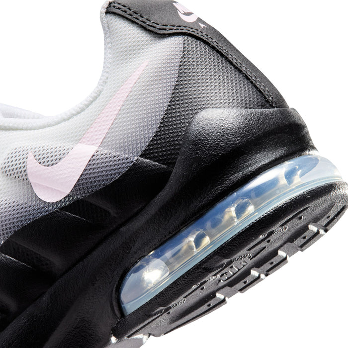 Close-up of youth sneakers, black heel and translucent Air unit with pink stripe