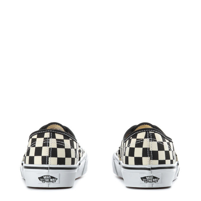 Youth checkerboard canvas sneakers from heel, black and white with Vans branding