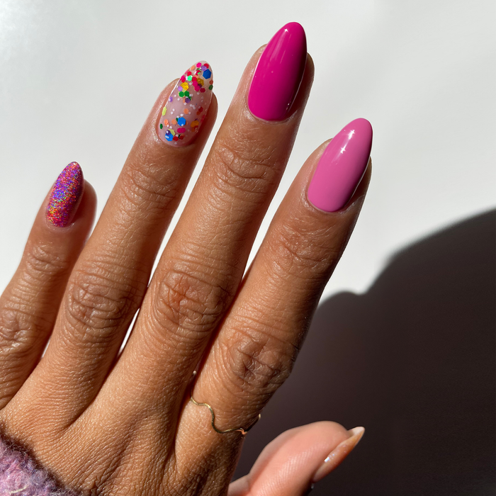 Birthday Collection raspberry wine nail polish with confetti glitter accent nail and rings