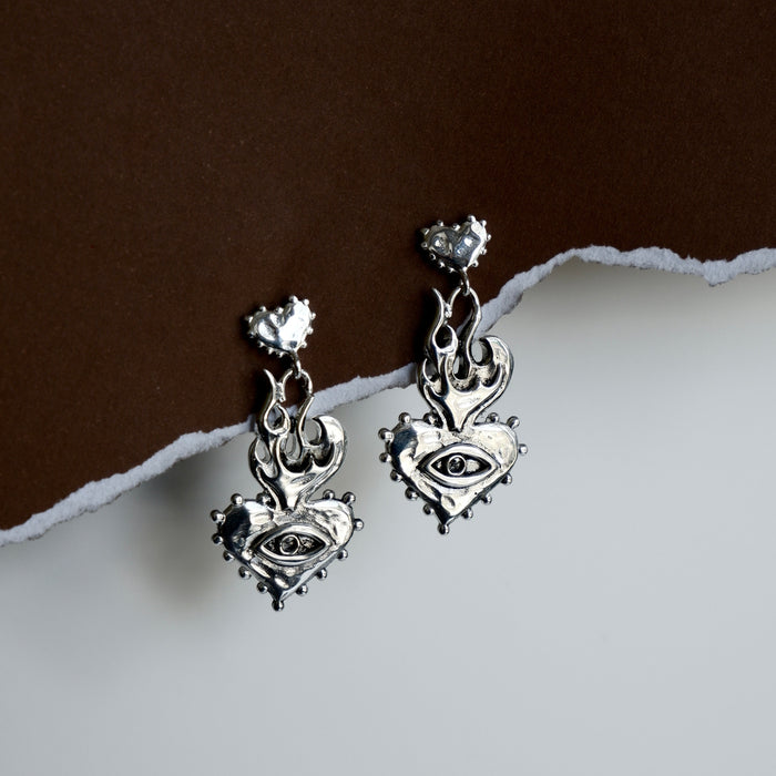 Luna & Rose x Tahnee Kelland ‘Burn It All Down’ silver flaming heart statement earrings, ethically made in Bali from recycled sterling silver Flat lay