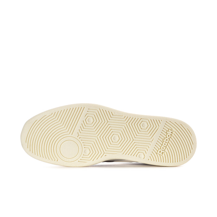 Cream rubber outsole with geometric tread pattern for men's white sneakers