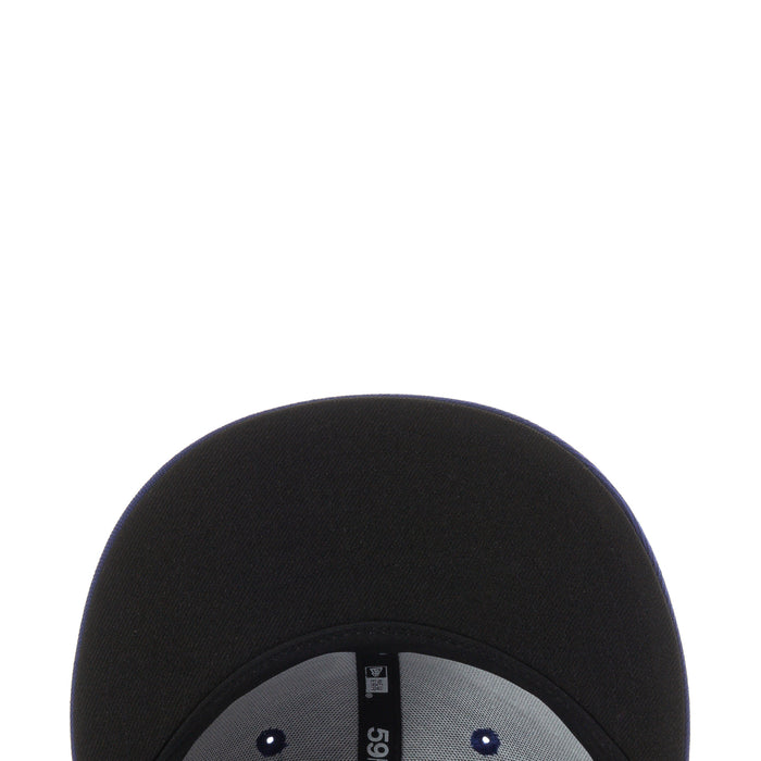 Black baseball cap crown with stitched opening and small ventilation eyelets