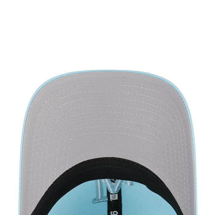 Baseball cap interior close-up with grey lining and black inner band