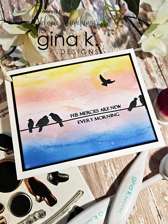 Gina K. Designs - Stamp - Serene Skies. Melanie Muenchinger has created some perfect silhouettes, powerlines and barbed wire fences to complement your blended ink backgrounds. This set is made of premium clear photopolymer and measures 6" X 8". Available at Embellish Away located in Bowmanville Ontario Canada. Example by Melanie Muenchinger.