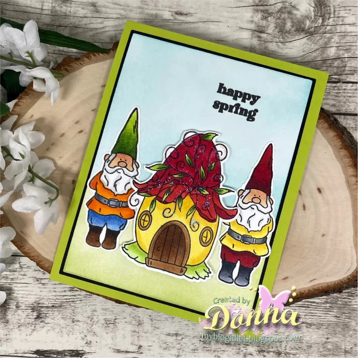Gina K. Designs - Stamp & Die Set - Spring Garden. Spring Garden is a stamp & die set by Hannah Drapinski. This set is made of premium clear photopolymer and measures 6" X 8". Available at Embellish Away located in Bowmanville Ontario Canada. Example by Donna