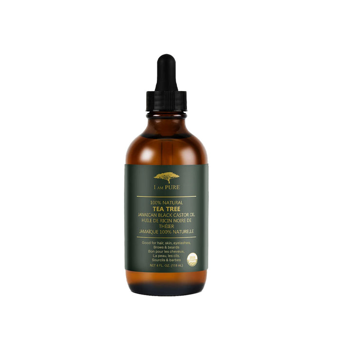 I AM PURE Jamaican black castor oil tea tree hair care oil in brown glass bottle with dropper