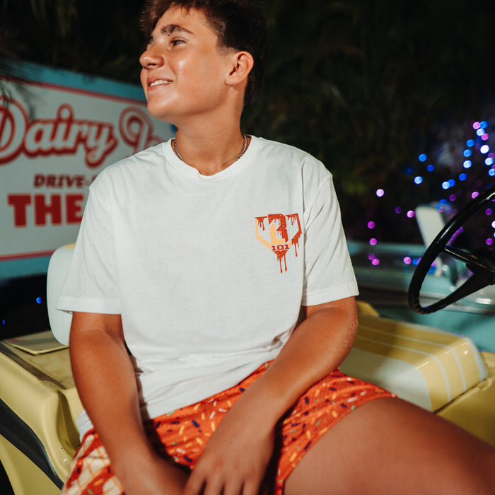 Adult model wearing red Ice Cream Cherry graphic tee
