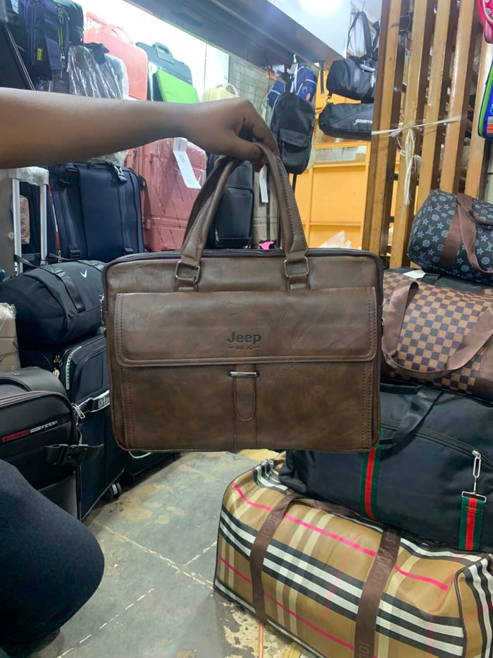 Jeep Buluo brown leather briefcase held in store