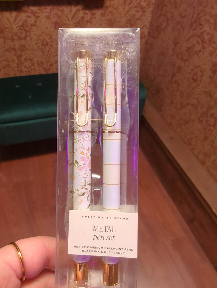 Set of metal pens from Sweet Water Decor featuring sleek, metallic finishes and a modern design, perfect for writing and office use.