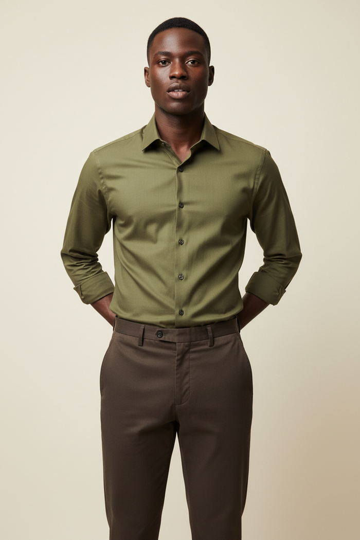 Full length model wearing Monza Olive Green Dress Shirt and Khaki Dark Brown Pants on cream background