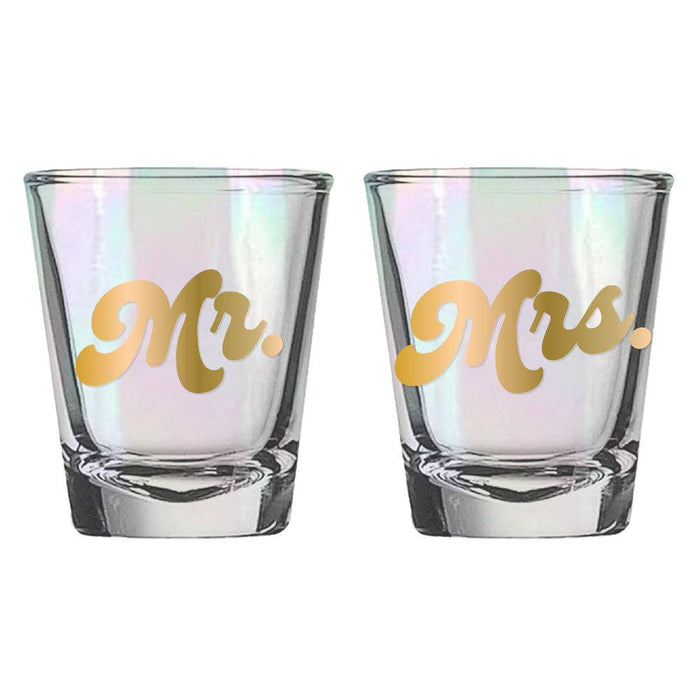 Set of two wedding shot glasses with "Mr." and "Mrs." lettering by Soiree Sisters, featuring elegant design and clear glass.