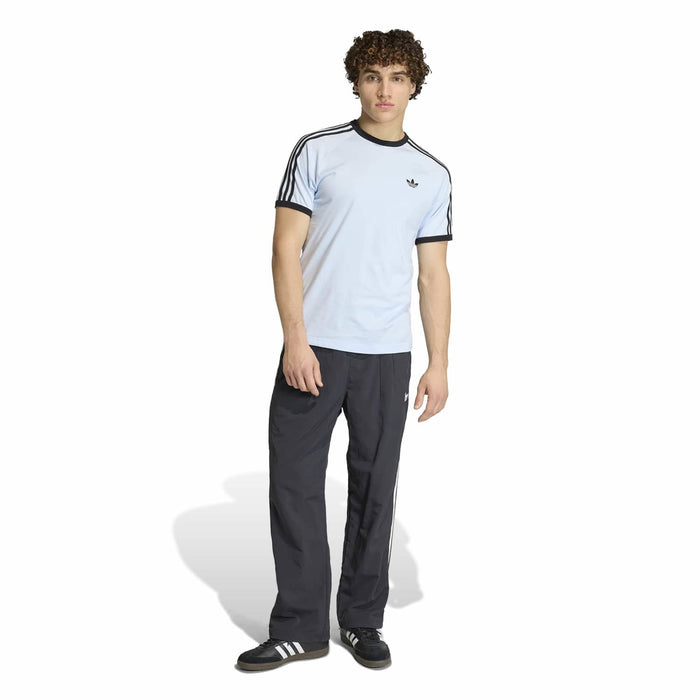 Light blue men's 3-stripe t-shirt with black shoulder stripes, crew neck