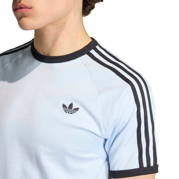Light blue men's 3-stripe t-shirt with trefoil logo and black shoulder stripes