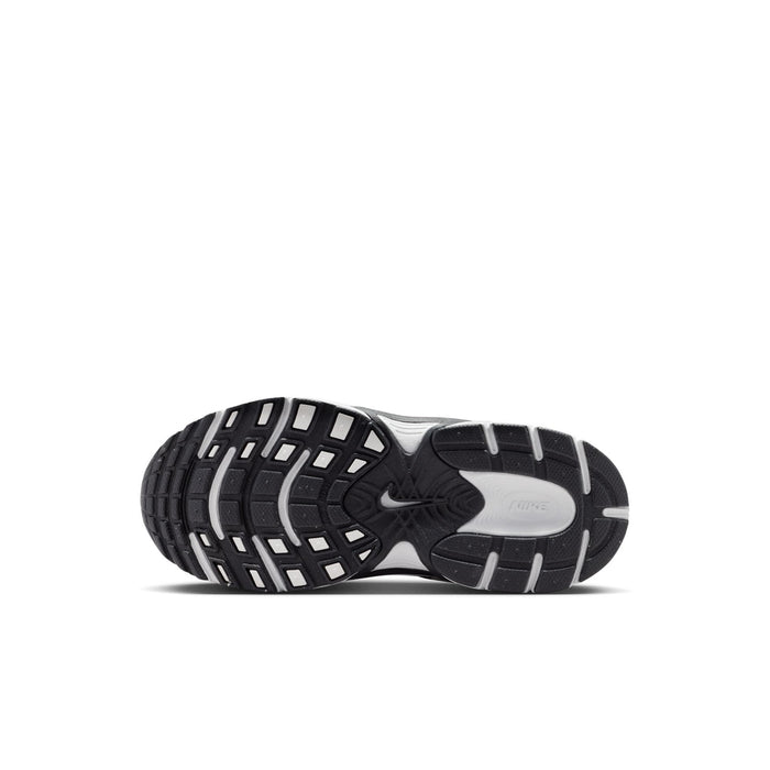 Kids sneaker outsole with tread pattern and Nike branding on heel