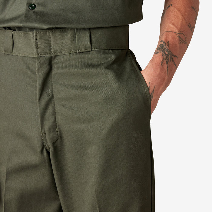 Olive green work pant waistband with belt loops and button closure.