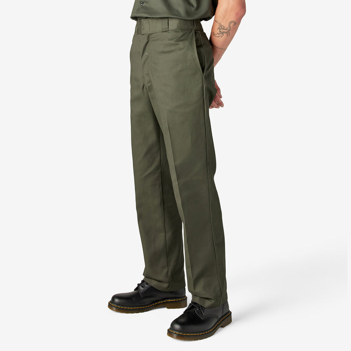 Olive green work pants side view with belt loops and button fly.