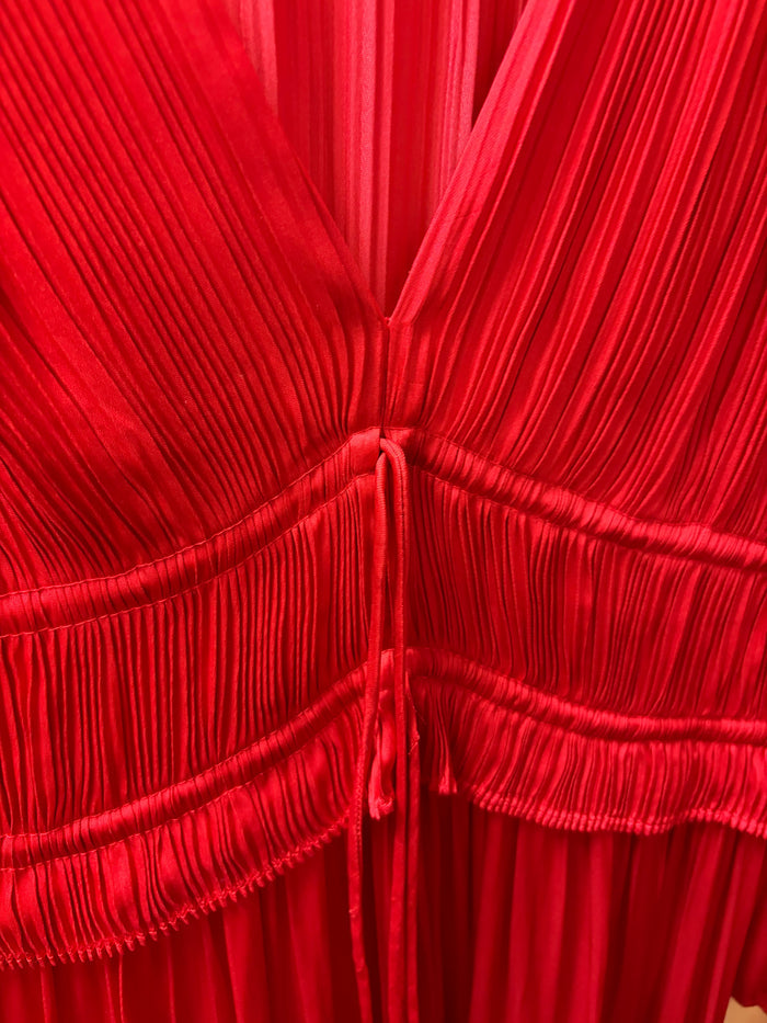 Red LS maxi dress by Current Air, featuring long sleeves and flowing fabric, displayed on a model.