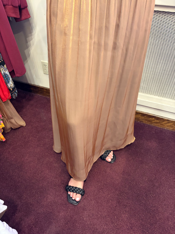 Golden silk halter dress by Current Air, showcasing elegant neckline and flowing fabric perfect for formal occasions.