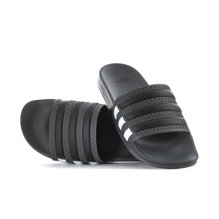 Men's black slide sandals with white triple stripes on the strap