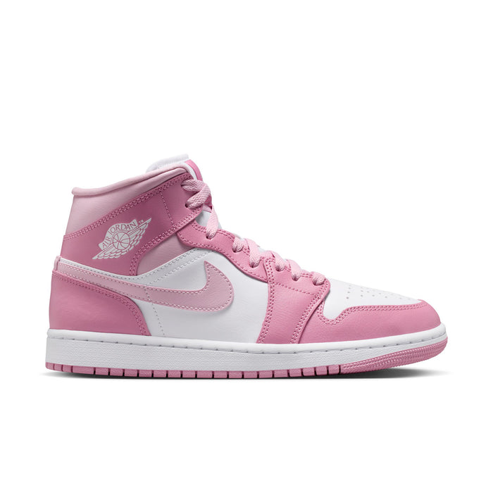 Women’s Air Jordan 1 Mid sneakers in pink, white, and sail with lace-up design