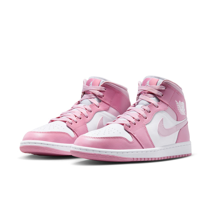 Women’s Air Jordan 1 Mid sneakers, pink and white leather with stitched Swoosh and laces