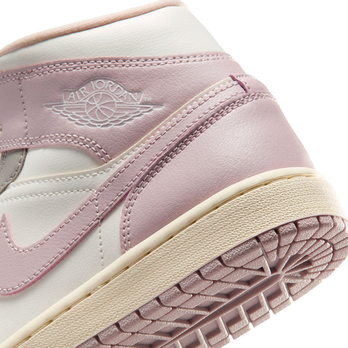Womens mid-top sneaker detail, Air Jordan logo and textured sole in white and lavender