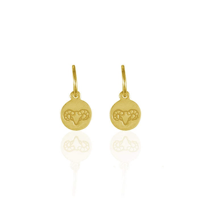 Small round gold earrings with a minimalistic geometric Aries Zodiac design and white background