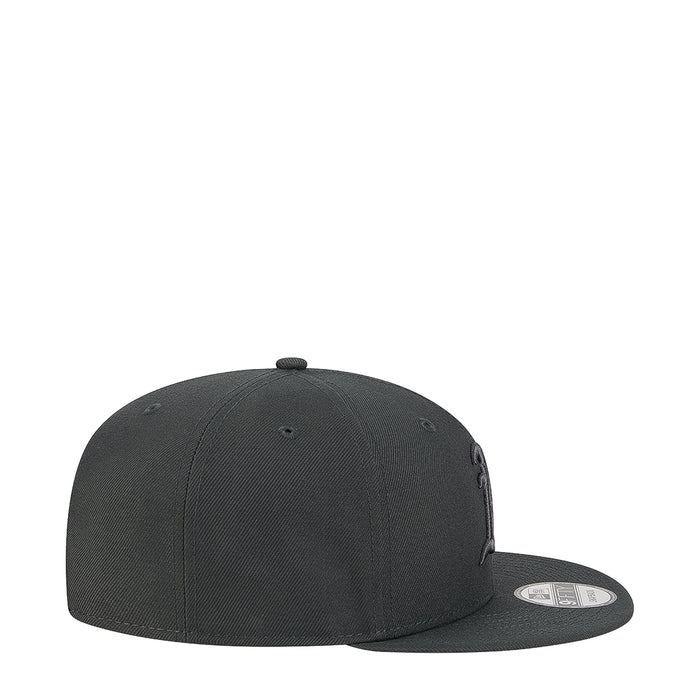 Dark gray baseball cap, side view with New Era logo patch on brim