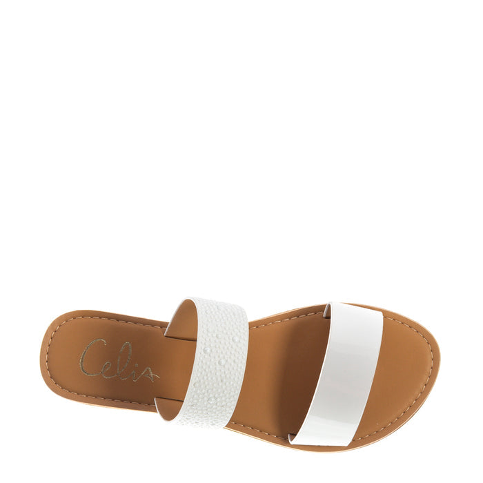 Women’s white two-band slide sandal with tan insole and visible stitching