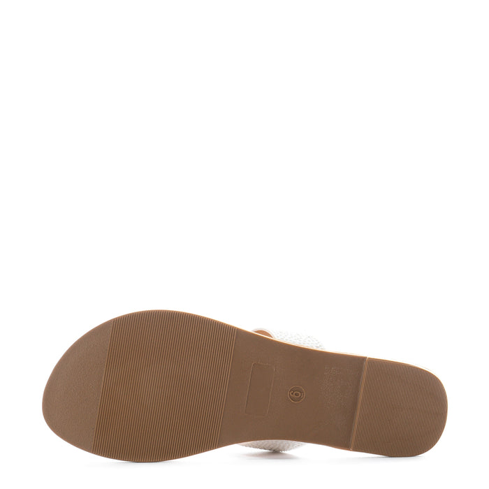 Women’s slide sandal outsole in brown with textured tread pattern