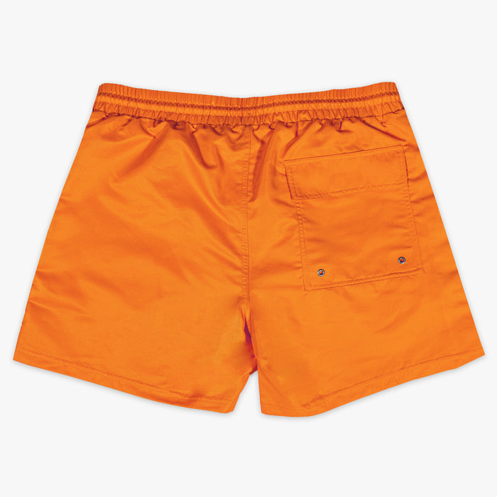Orange shorts with a pocket on a white background