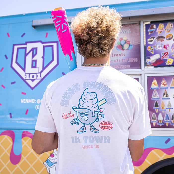 Adult model wearing white graphic tee with “Best Batter” design