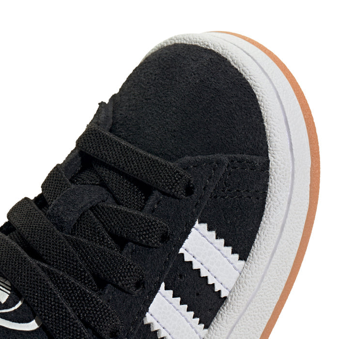 Toddler black suede sneaker with textured lace strap and white three-bar stripes