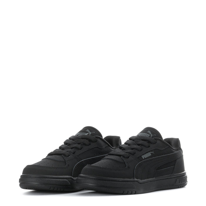 Pair of kids' black Puma lace-up sneakers with side stripes and low-profile sole