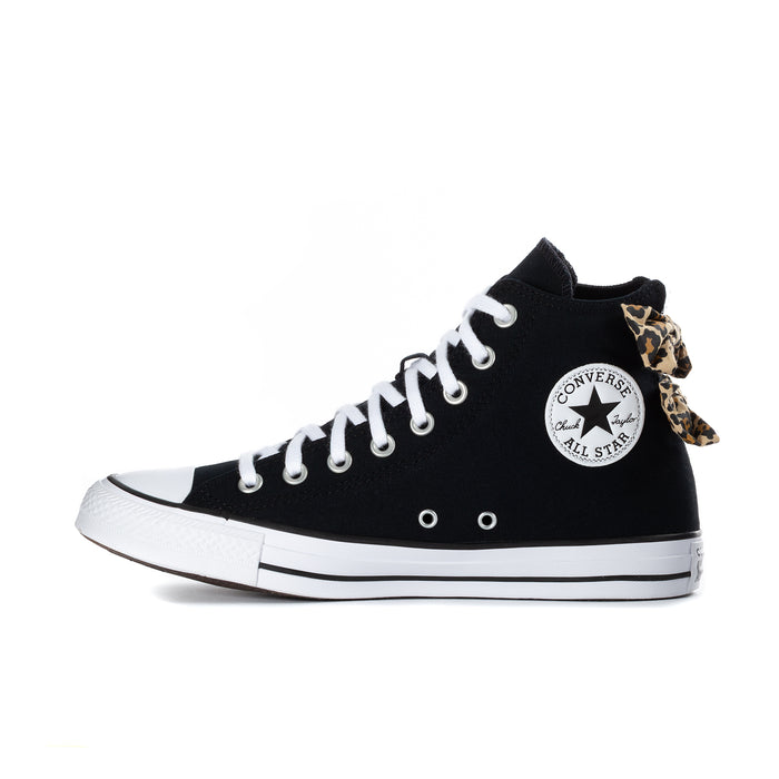 Black high-top sneakers with Converse All Star patch, white laces, leopard bow
