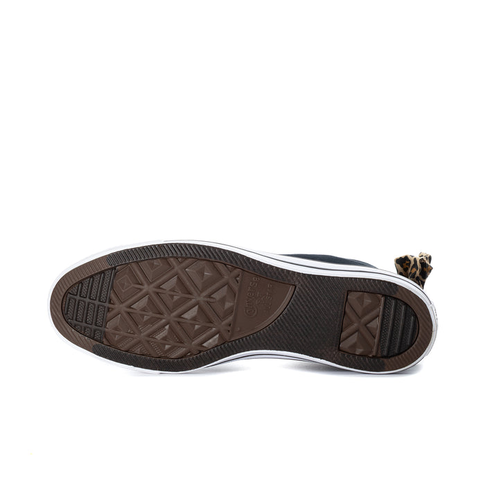 Black high-top sneaker outsole with tread and white rubber toe edge