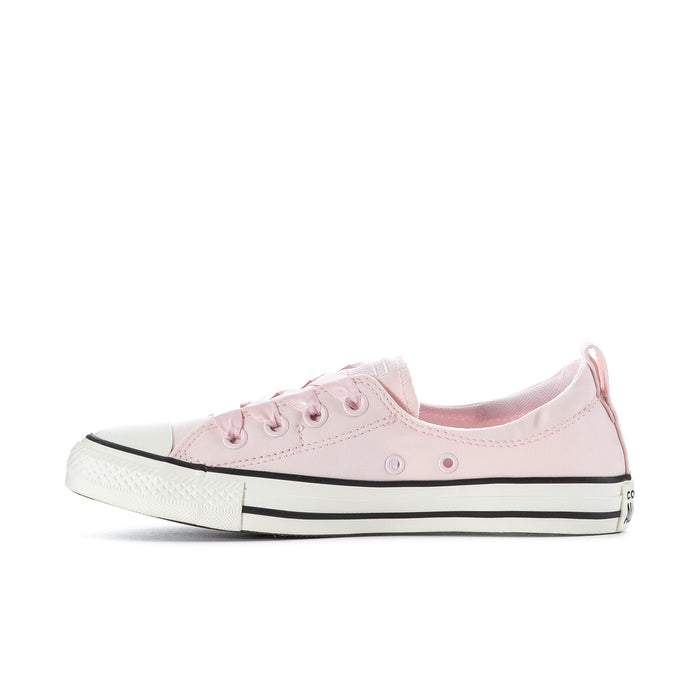 Women's light pink low-top lace-up sneakers with black-and-white striped midsole