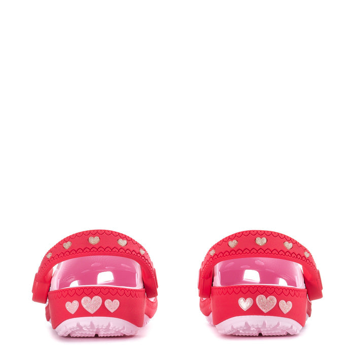 Toddler clog back view with red heel cap and heart-pattern ventilation