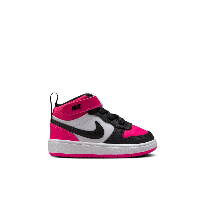 Toddler mid-top sneakers in white, black, and bright pink with Nike Swoosh