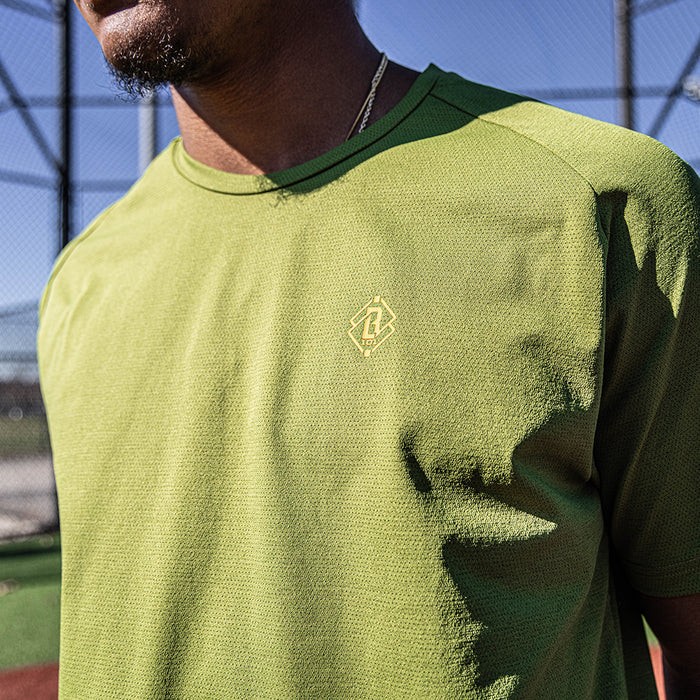 Olive green and orange Diamond Tech youth graphic tee — front view