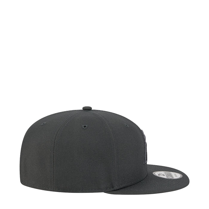 Dark gray baseball cap with curved brim, side profile