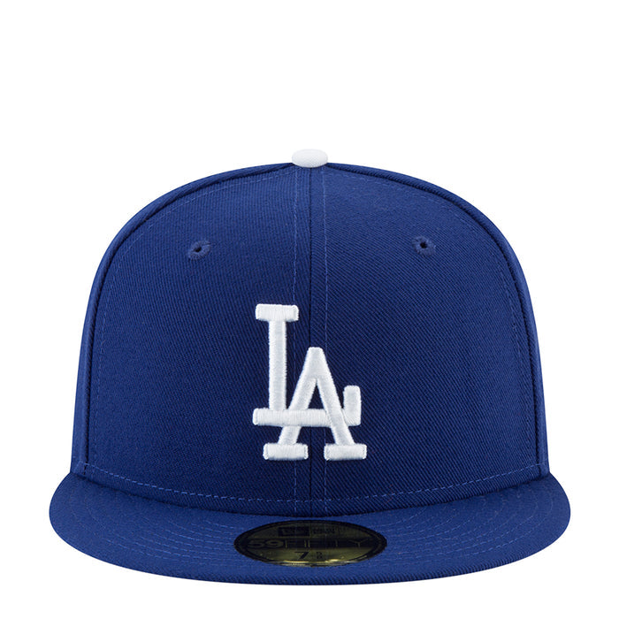 Royal blue baseball cap with white LA monogram front