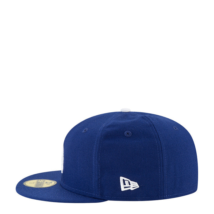 Royal blue baseball cap with New Era logo on side and flat brim