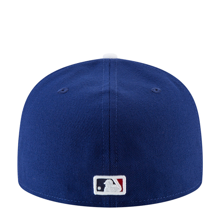 Royal blue baseball cap with MLB batter logo on back