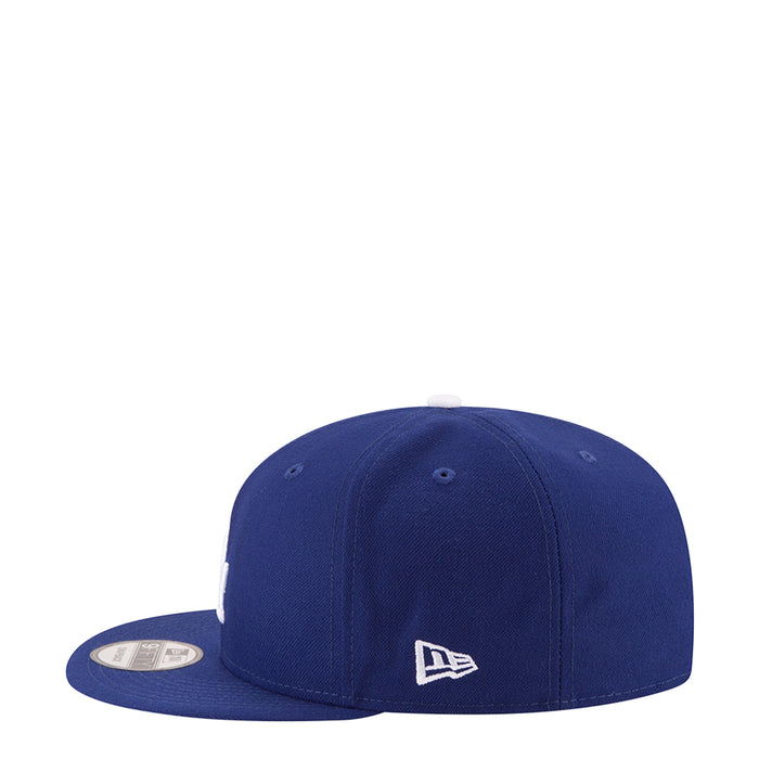 Royal blue 950 baseball cap with New Era logo patch on the side