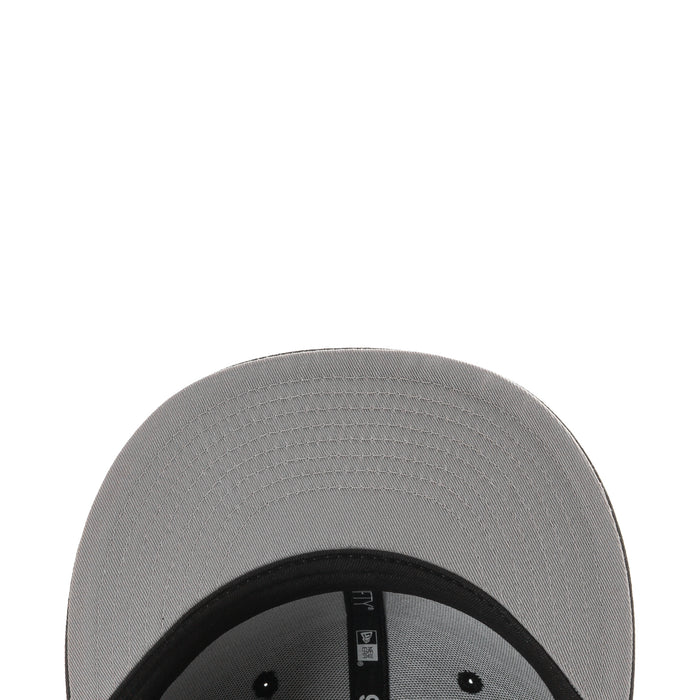 Gray 950 baseball cap underside with black inner band and brand label