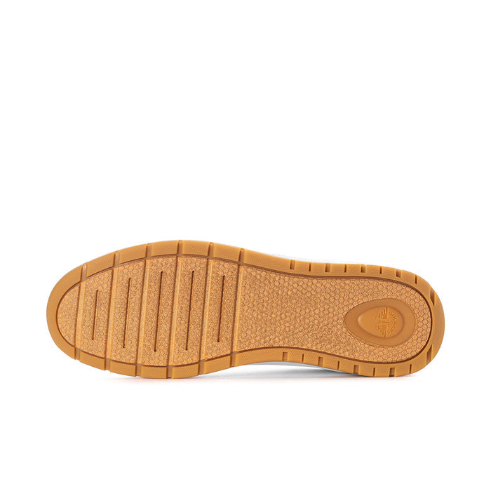 Bottom view of men's white sneaker with textured gum rubber outsole
