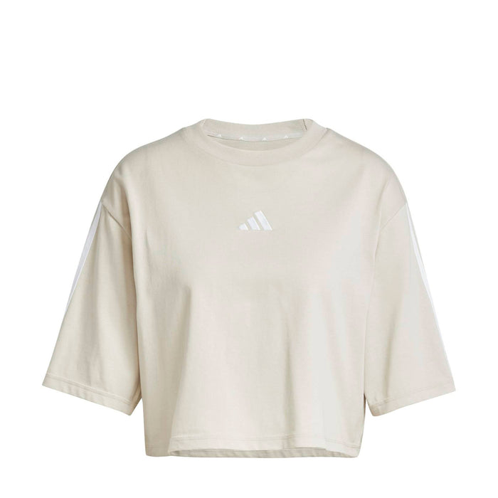 Light cream women’s cropped t-shirt with small adidas logo at center chest