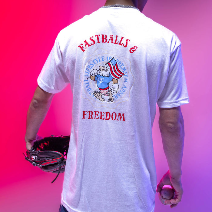 Adult model wearing graphic tee with “Fastballs & Freedom” design