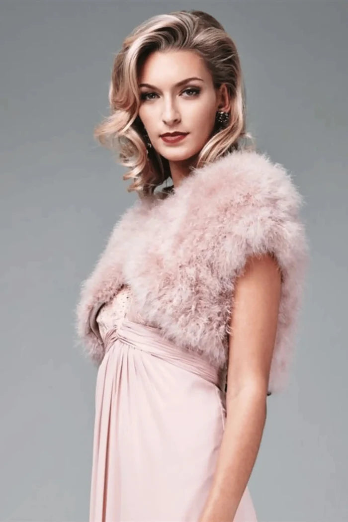 Soft pink Feather Shrug FK042 by Mascara London styled with a blush gown, ideal for prom or bridesmaid wear.